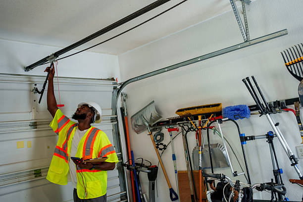 Professional Garage Door Roller Replacement technician working in Churubusco, IN